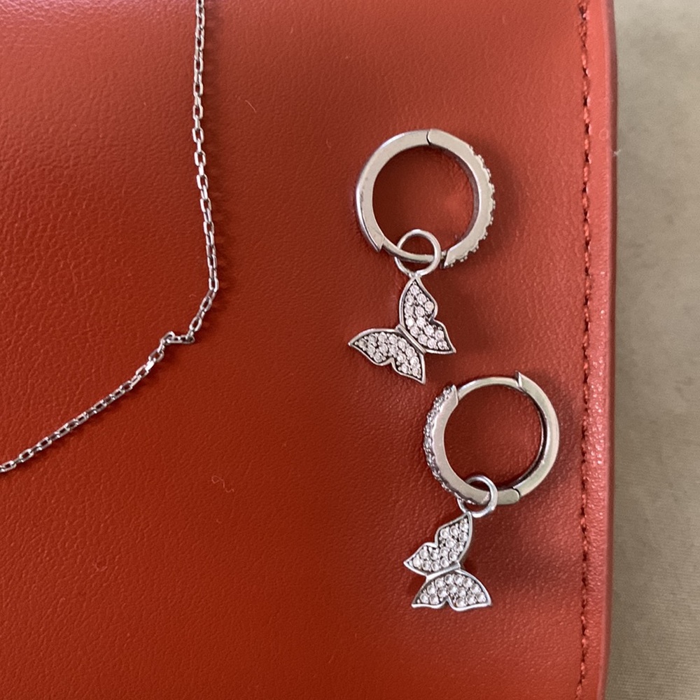 SHOP PAIGE NY Silver Butterfly Huggie Earrings